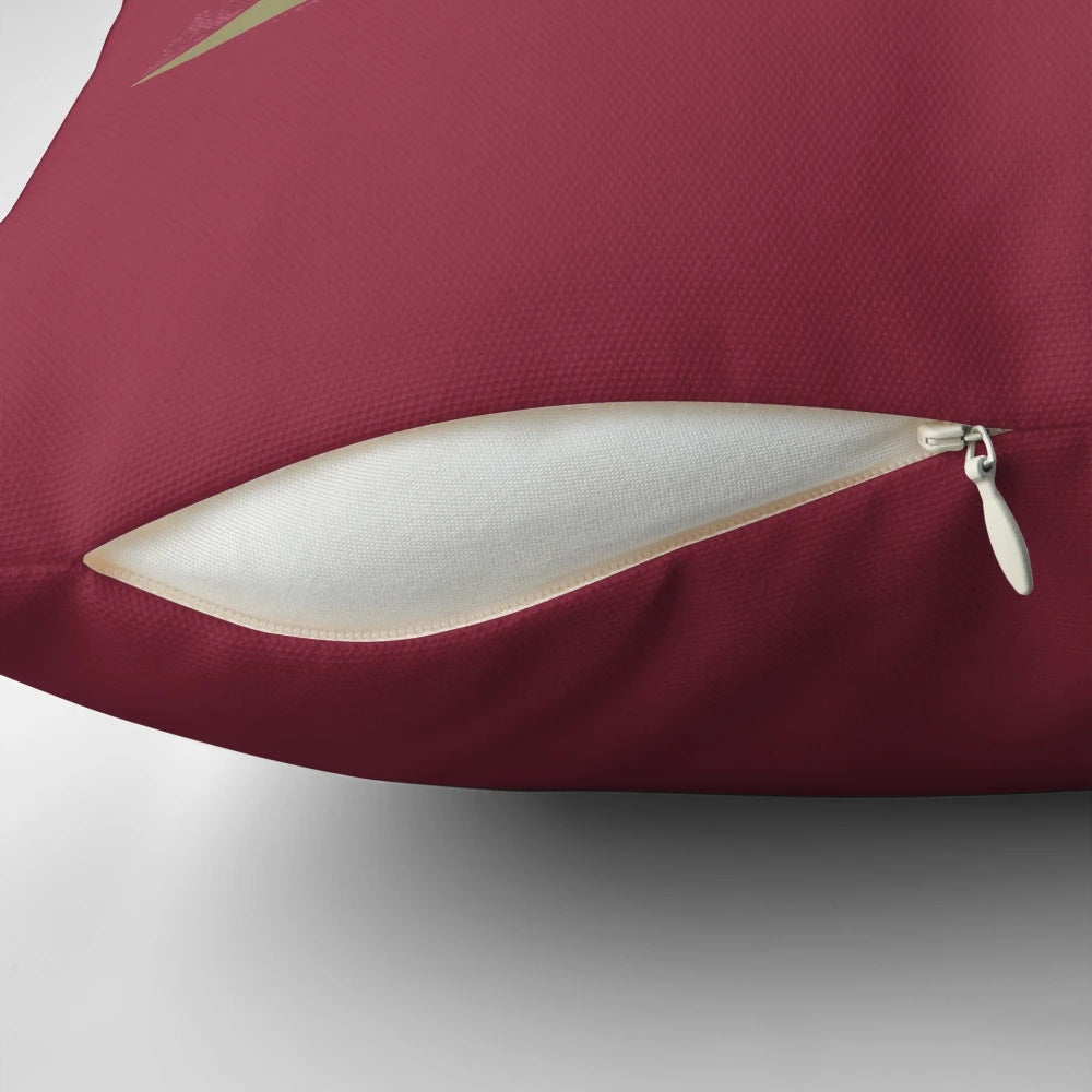Merry Extinction Pillow featuring a whimsical T-Rex in a Santa hat, a festive dinosaur-themed Christmas decoration.