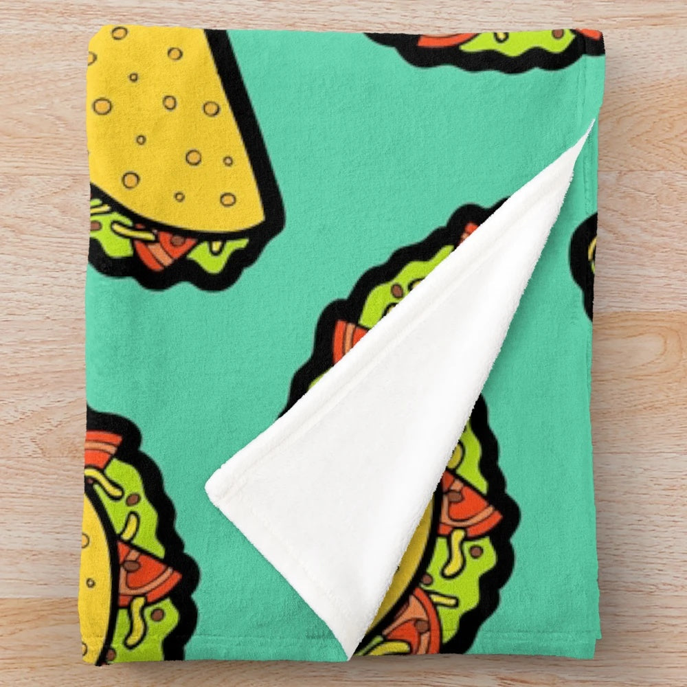 Colorful taco-themed plush blanket with a fun, hand-drawn pattern