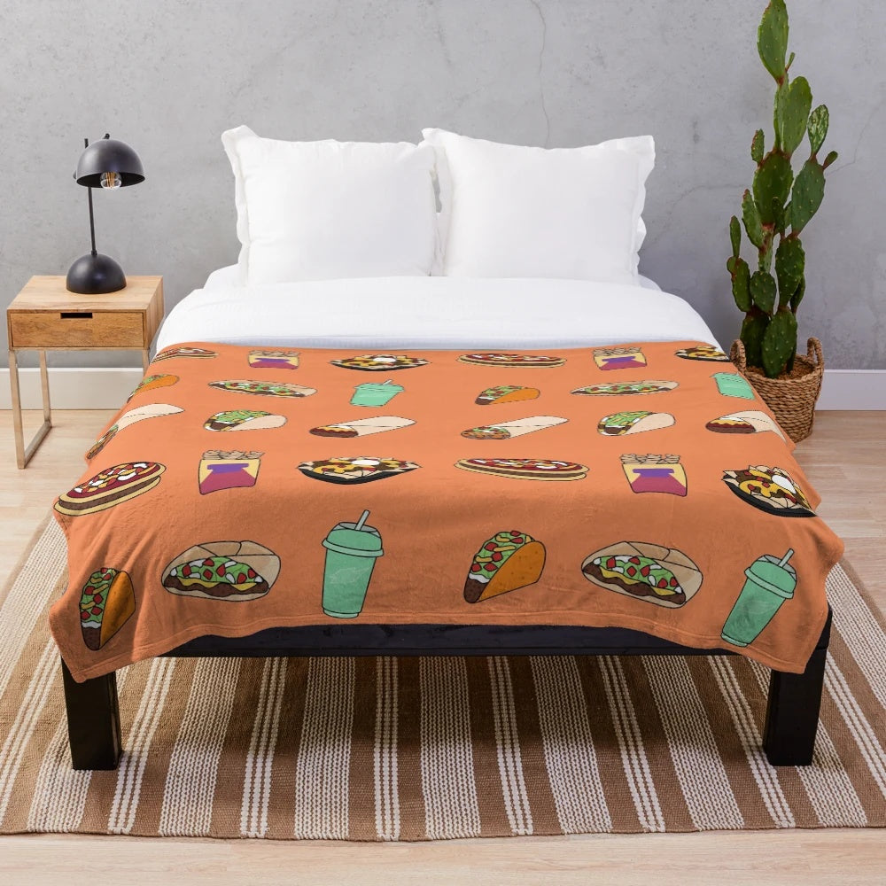 Taco-themed plush blanket with cute doodle design