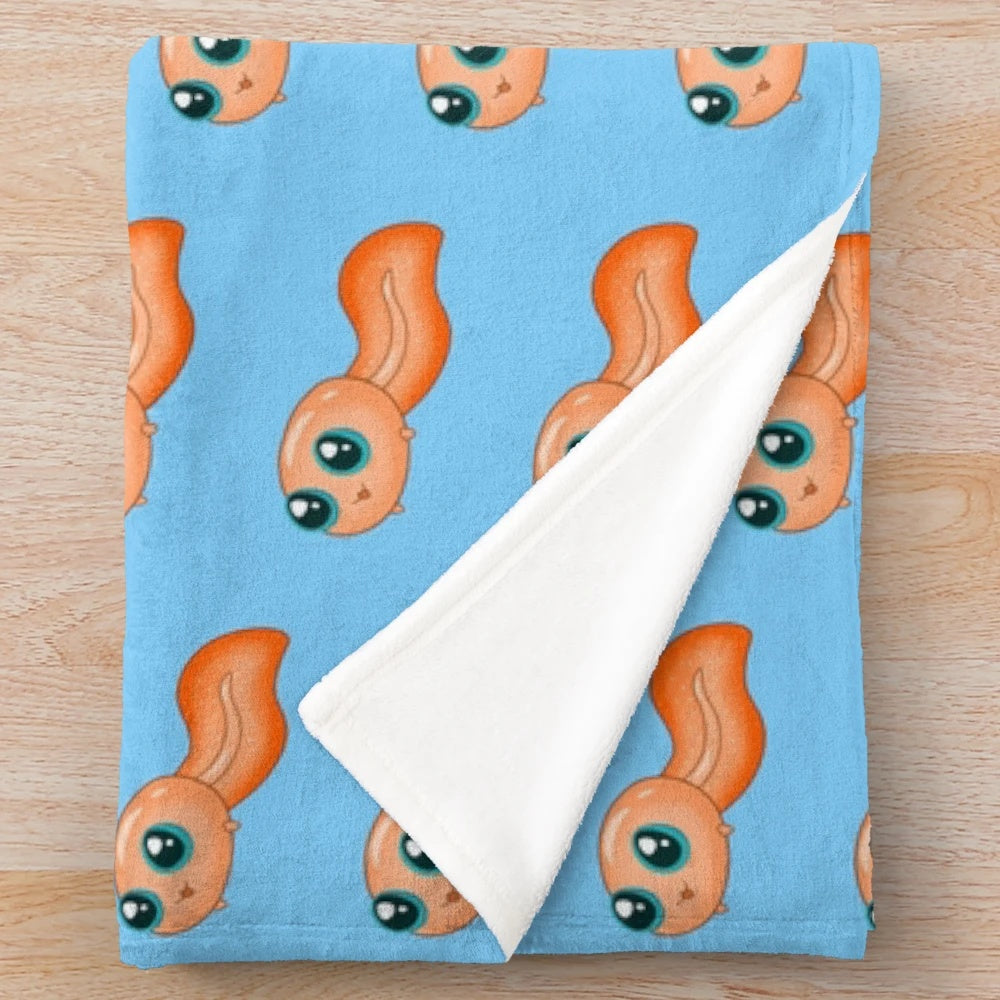 Orange tadpole plush blanket with cute amphibian design