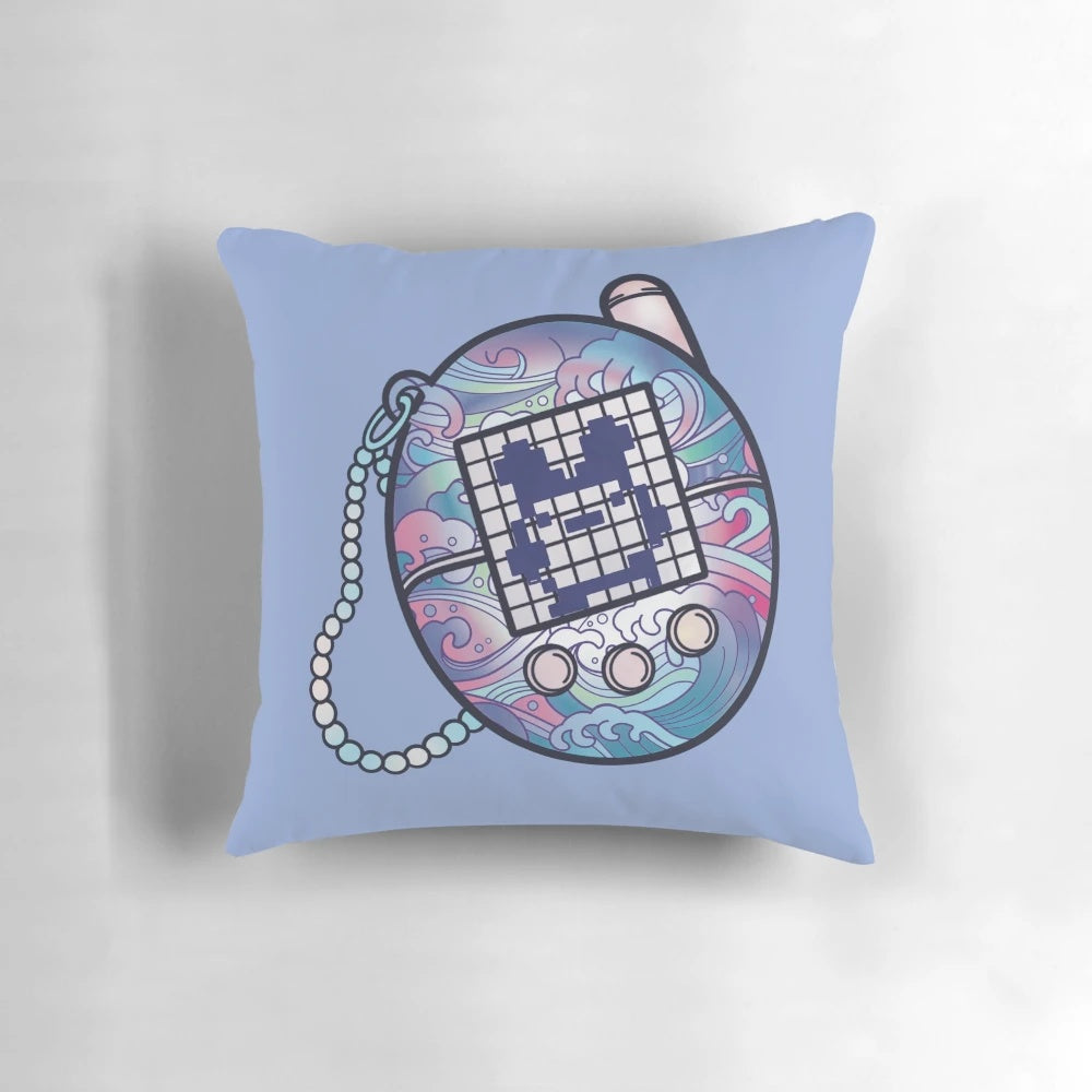 Plush tamagotchi-themed pillow in a retro, kawaii aesthetic