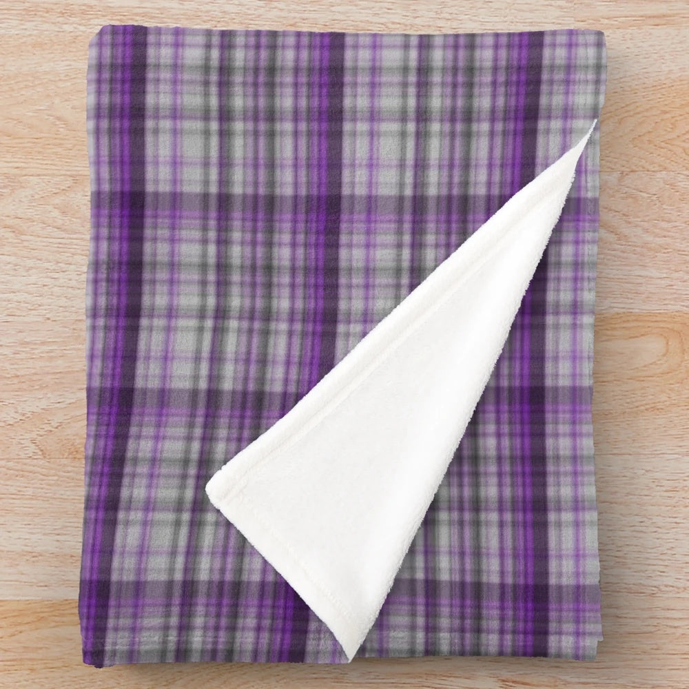 Soft and warm tartan-patterned plush blanket in shades of purple and grey