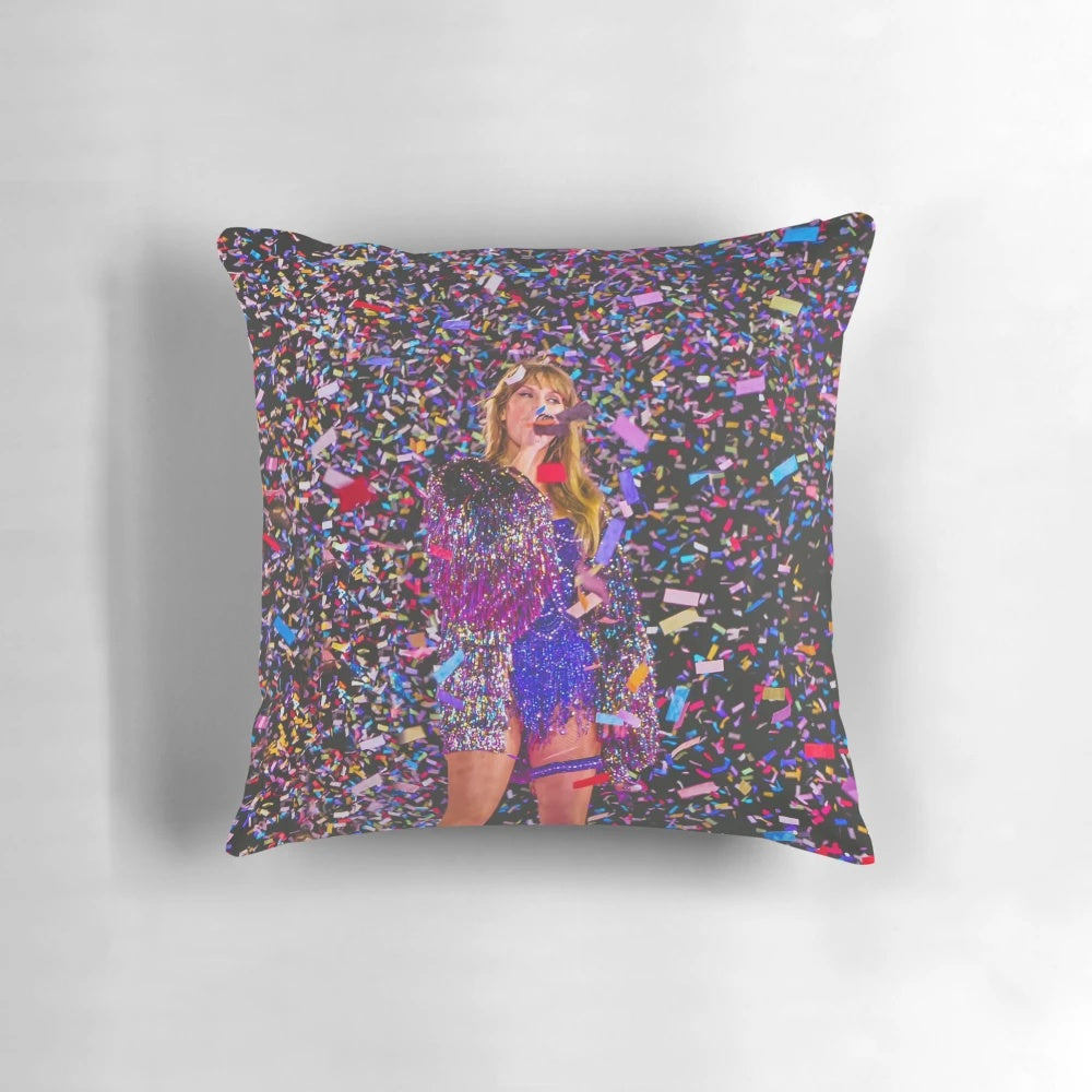 A soft, plush pillow featuring a colorful confetti design inspired by Taylor Swift's "Eras Tour