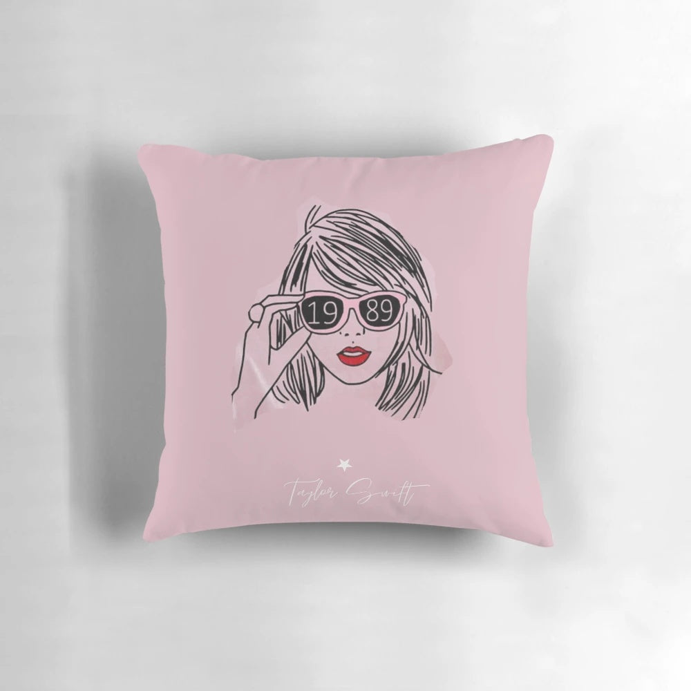 Soft, plush pillow featuring the Taylor Swift logo and "Swiftie" text