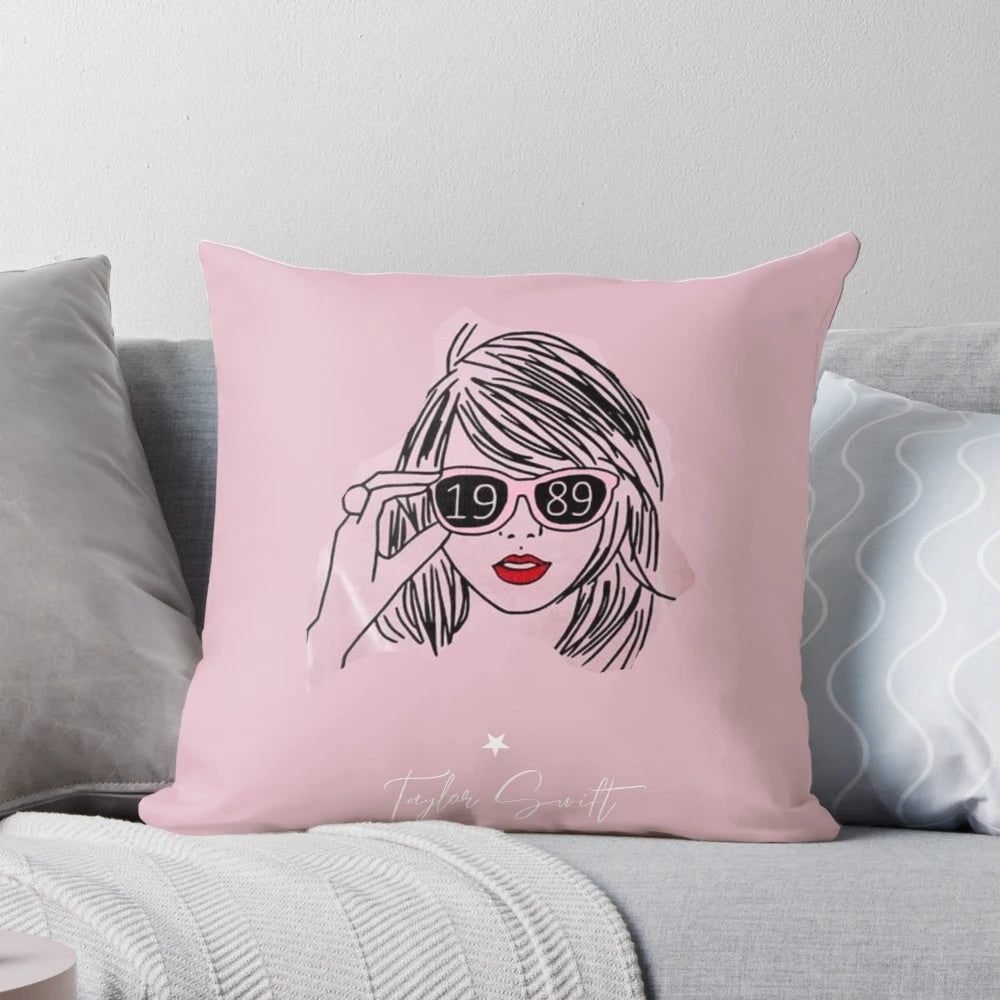 Soft, plush pillow featuring the Taylor Swift logo and "Swiftie" text