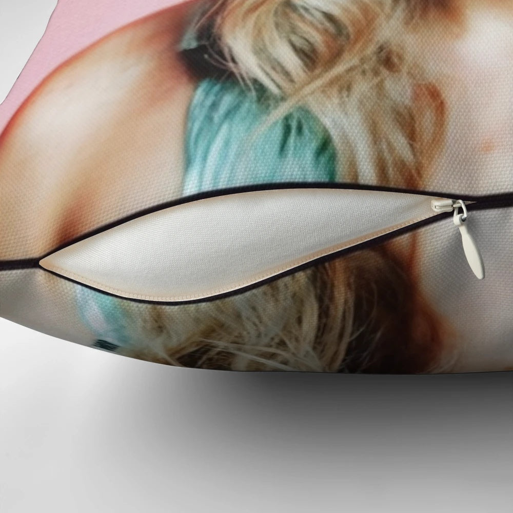 A soft, plush pillow featuring the image of popular singer-songwriter Taylor Swift.