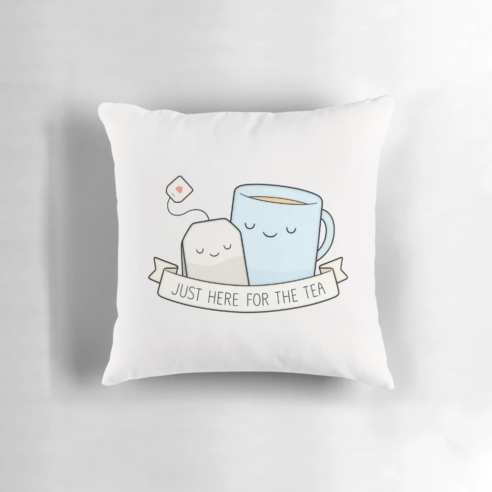 Soft, plush pillow with a cute, whimsical "Here for the Tea" design, perfect for tea lovers and pun enthusiasts.