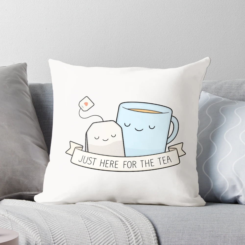 Soft, plush pillow with a cute, whimsical "Here for the Tea" design, perfect for tea lovers and pun enthusiasts.