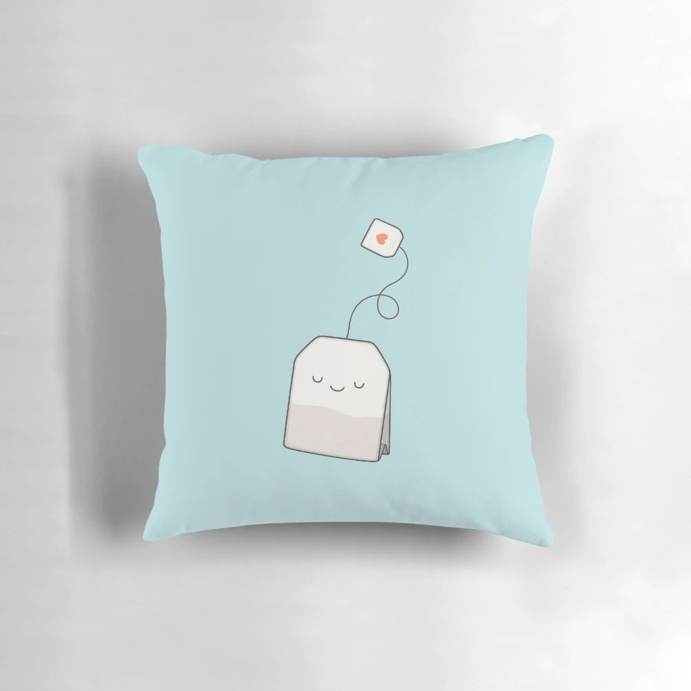 A soft, silk tea-themed pillow with a cute and kawaii design, perfect for a relaxing morning tea break.
