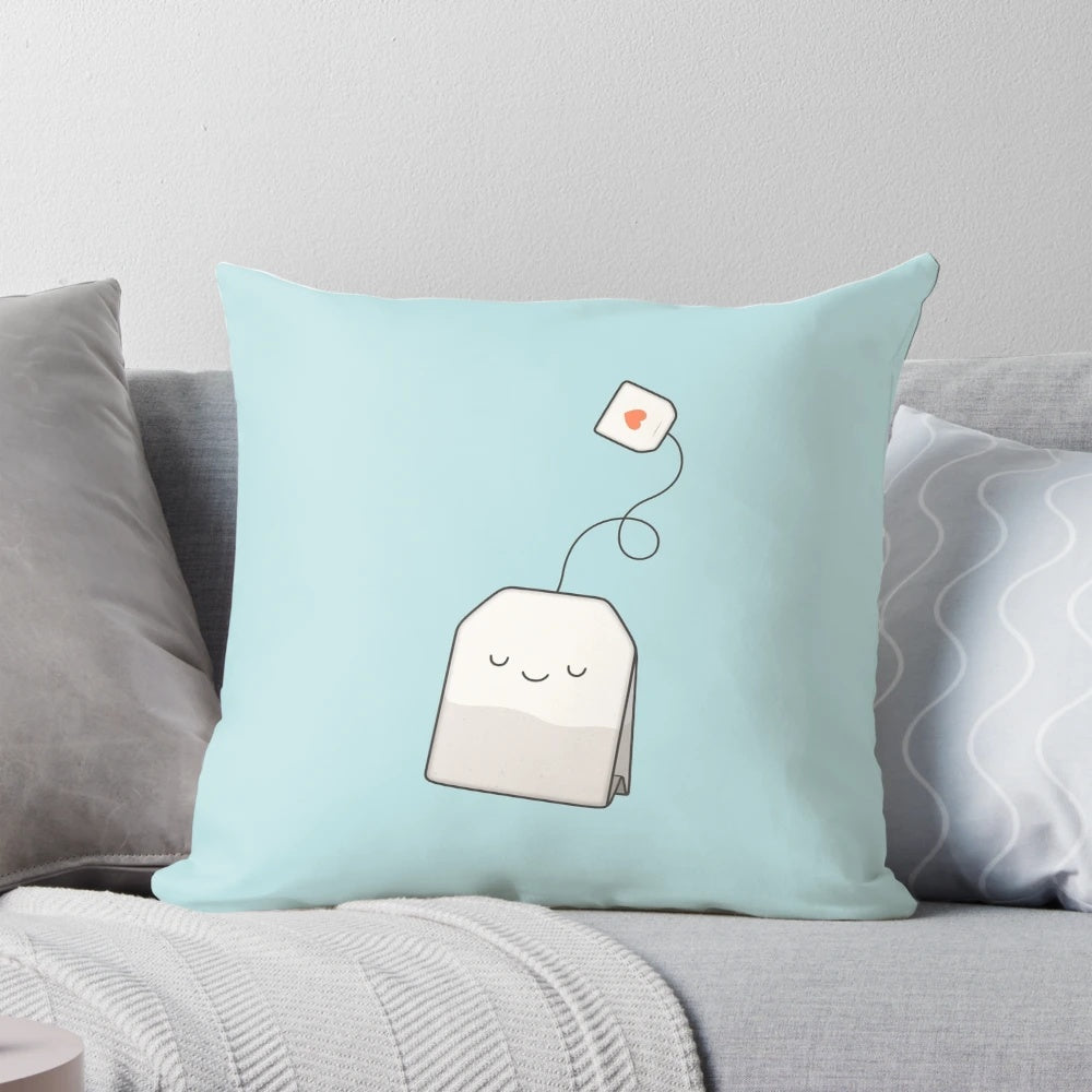 A soft, silk tea-themed pillow with a cute and kawaii design, perfect for a relaxing morning tea break.