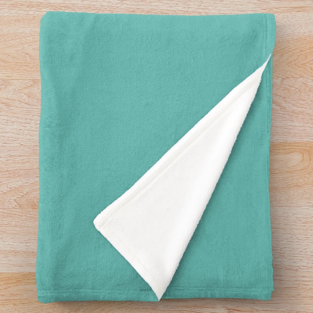 Soft plush blanket with "Teach Peace" design, perfect for educational settings and home decor.