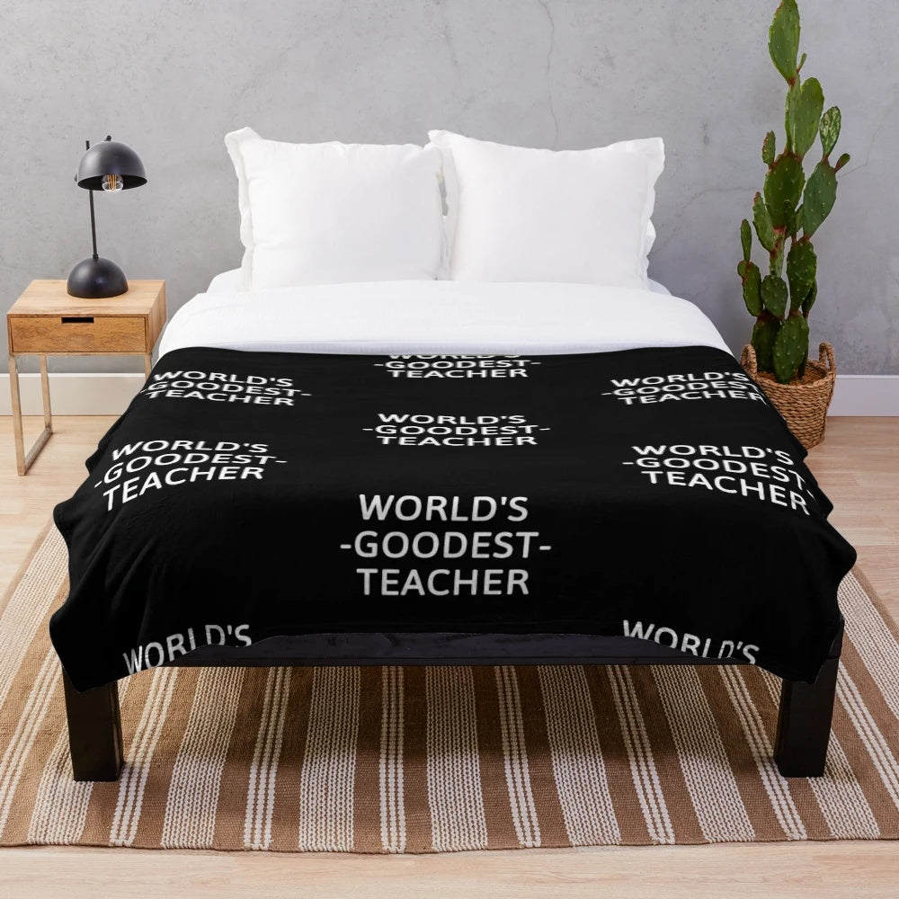 Soft, comfy teacher plush blanket with "World's Goodest Teacher" design