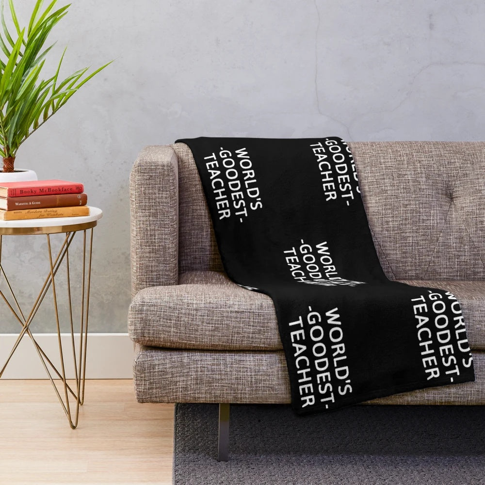 Soft, comfy teacher plush blanket with "World's Goodest Teacher" design