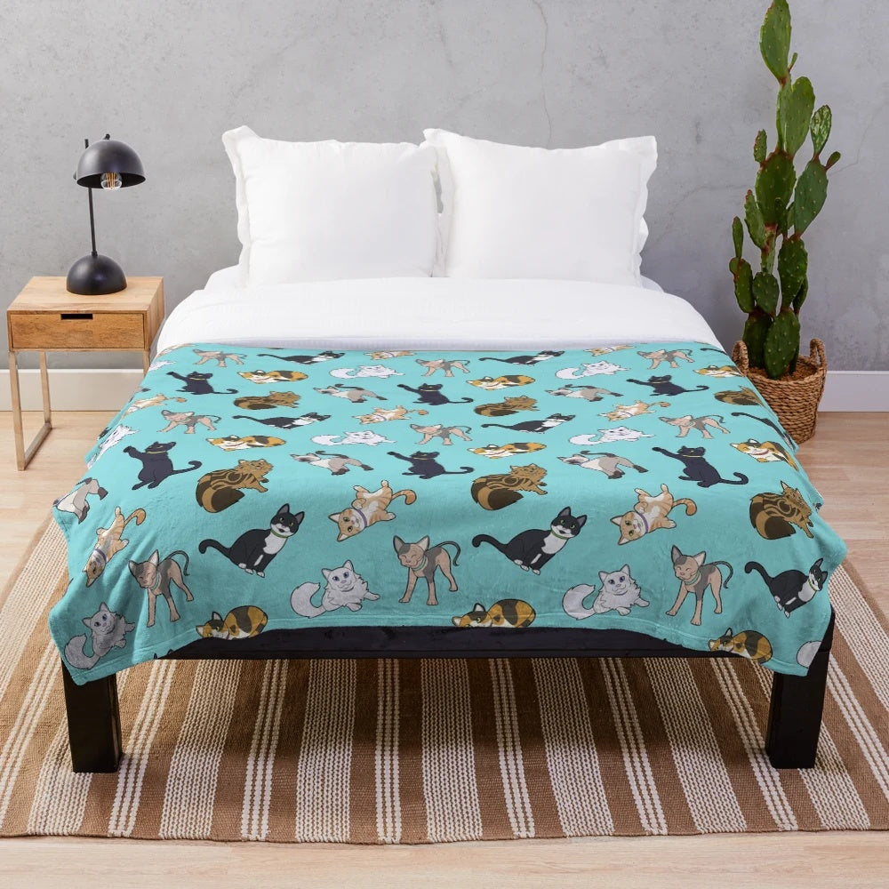 Teal plush blanket with cute cat pattern design
