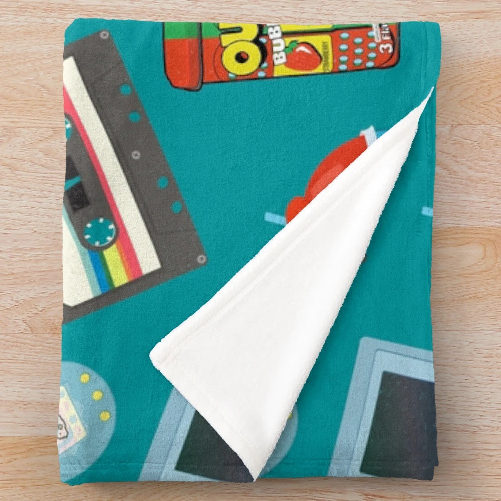Teal plush blanket with nostalgic retro patterns