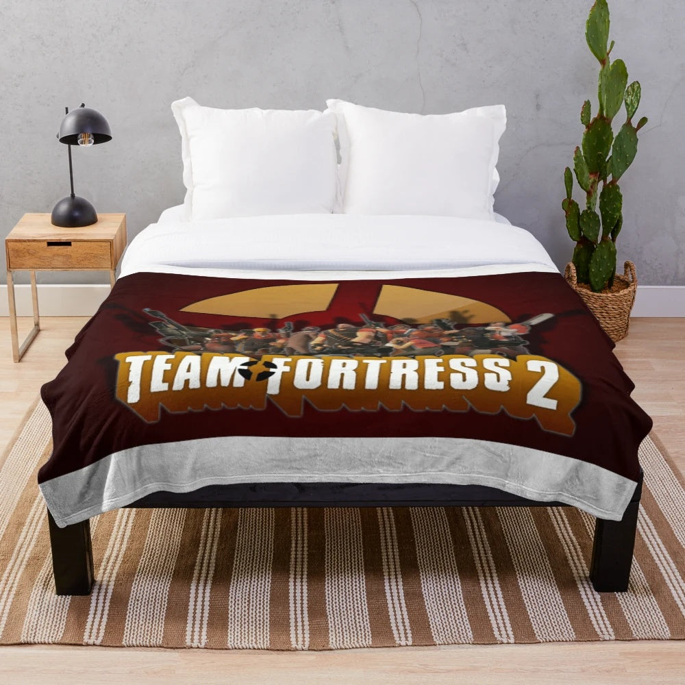 Team Fortress 2 inspired plush blanket with game logo