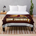 Team Fortress 2 inspired plush blanket with game logo
