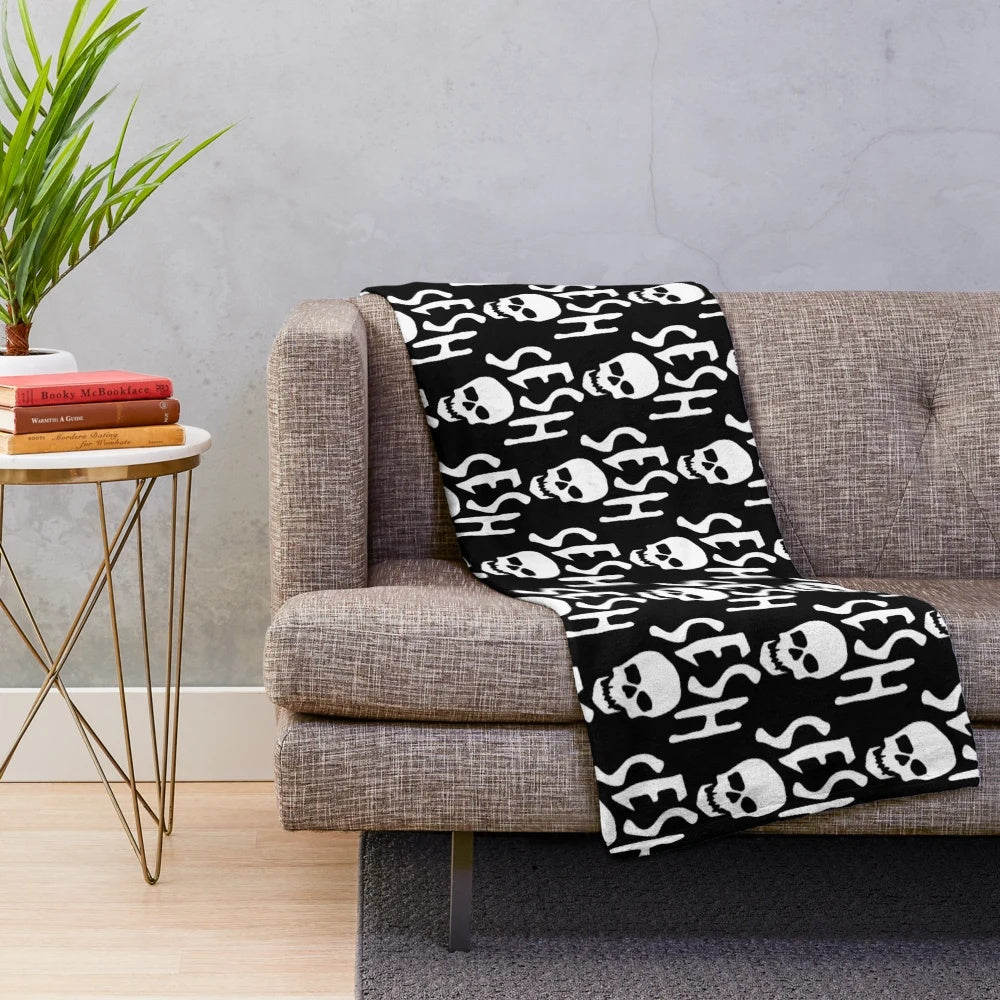 Team Sesh white logo printed on a soft, plush blanket