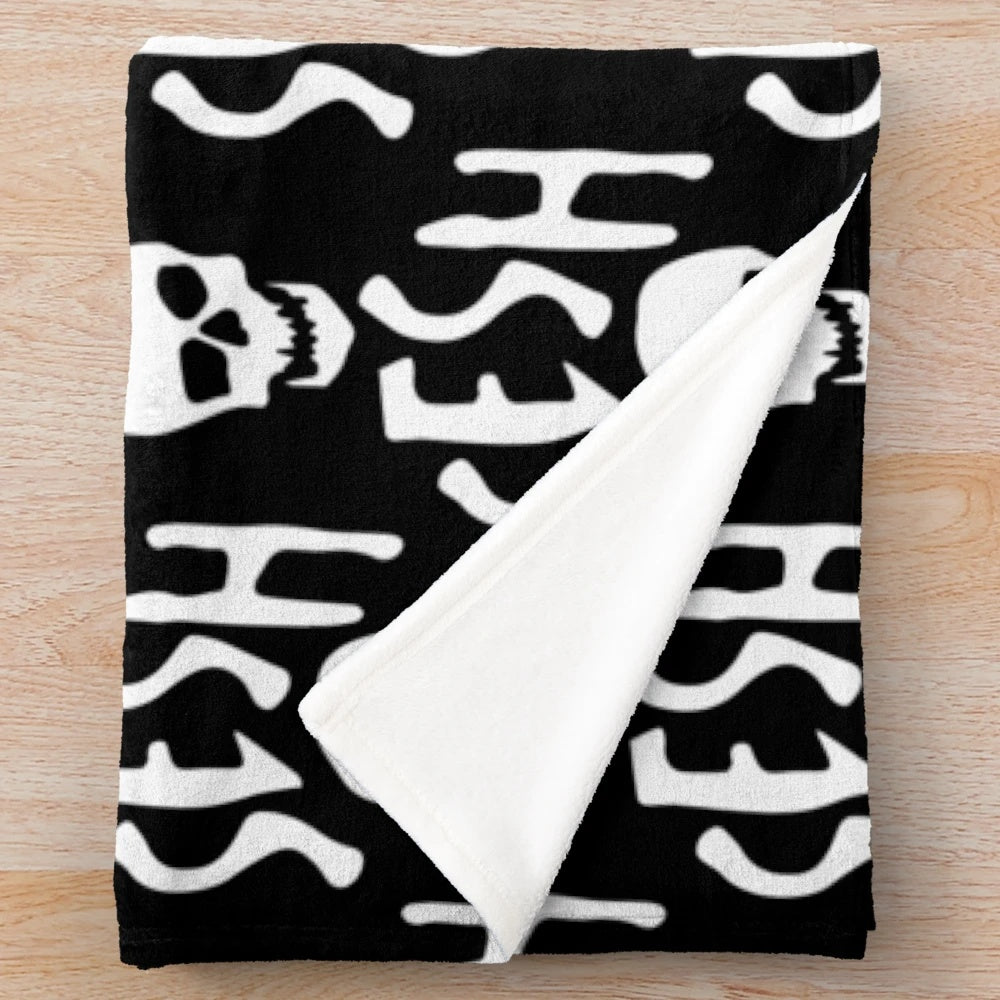 Team Sesh white logo printed on a soft, plush blanket