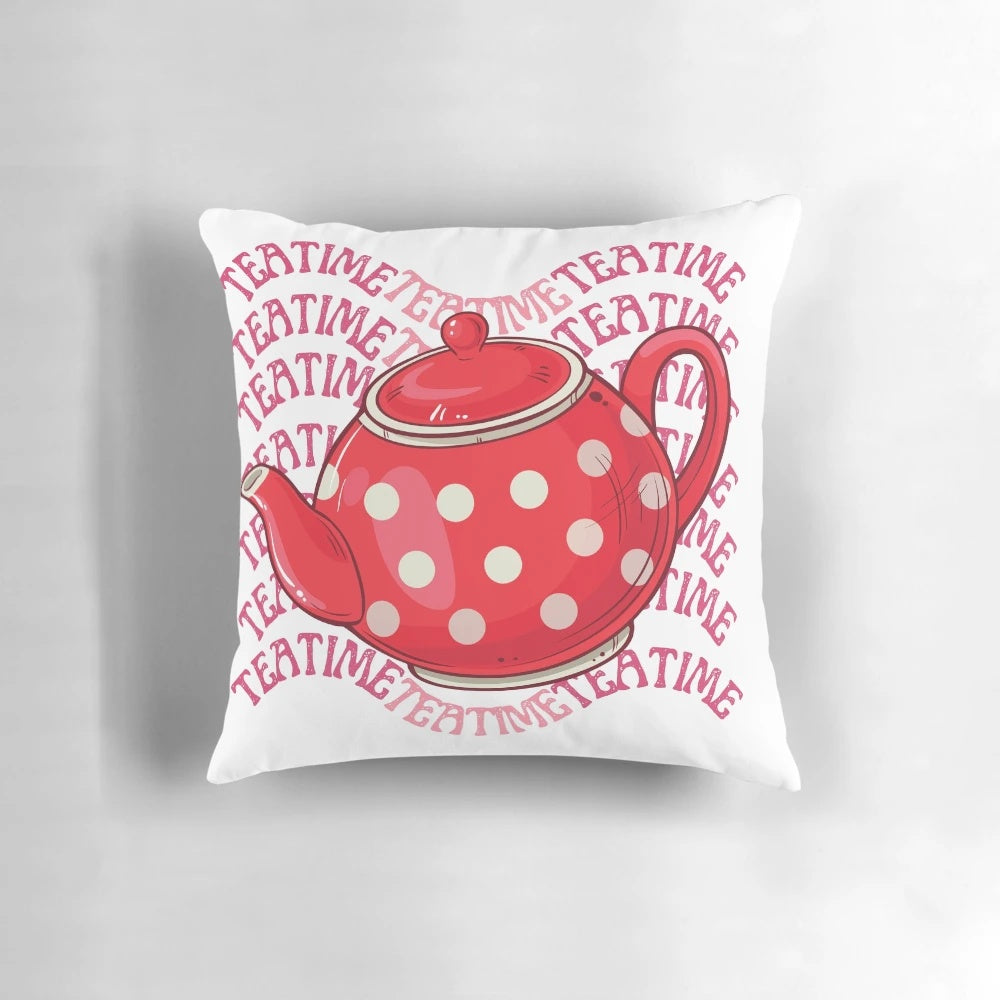 A cozy and charming teatime-themed pillow featuring a red teapot and floral design.