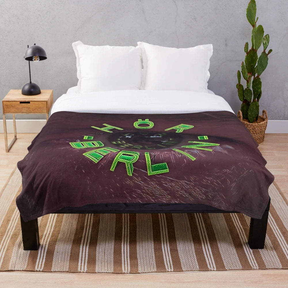 Techno-inspired plush blanket with vibrant colors and patterns