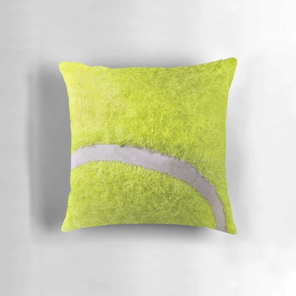 A plush, decorative throw pillow featuring a vibrant tennis ball design, perfect for adding sporty style to a man cave or home.