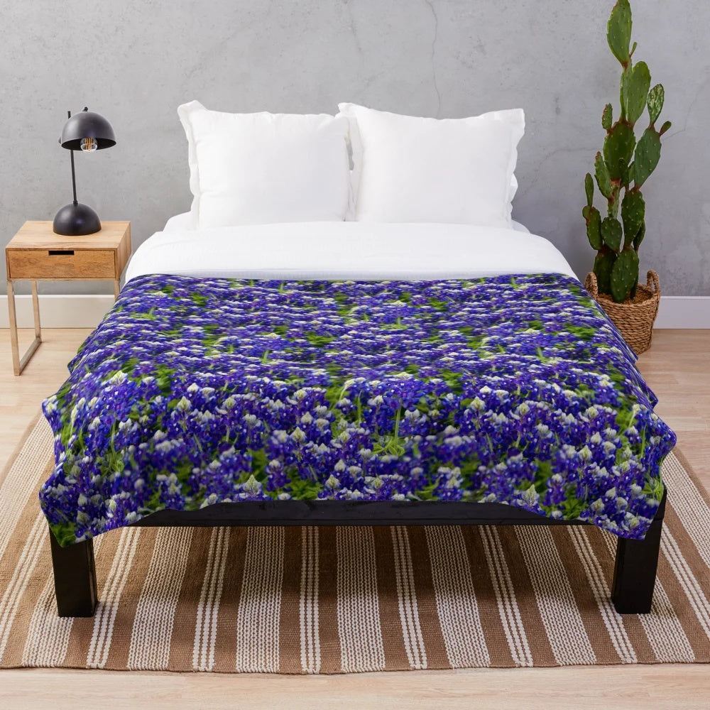 Plush blanket with vibrant bluebonnet floral design