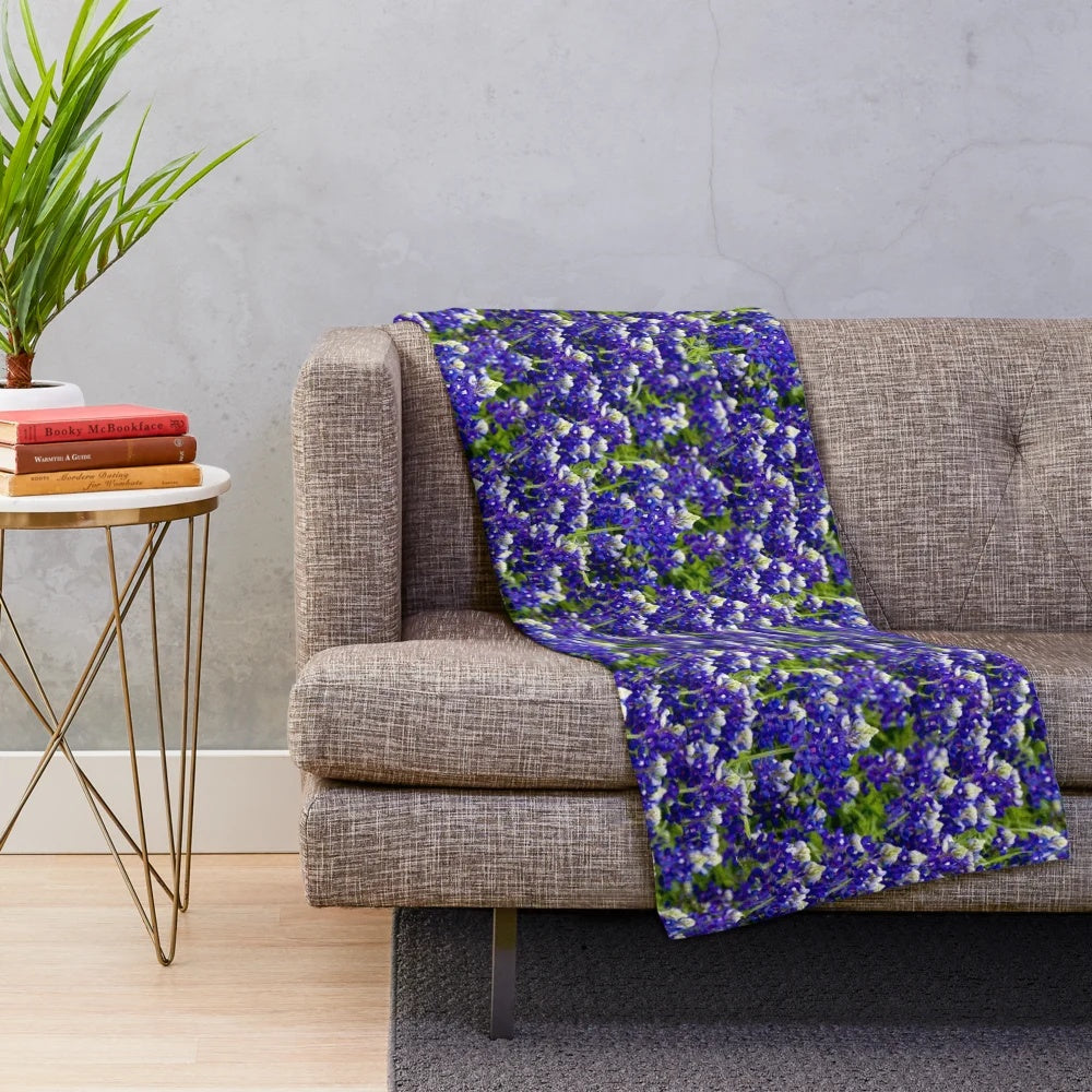 Plush blanket with vibrant bluebonnet floral design