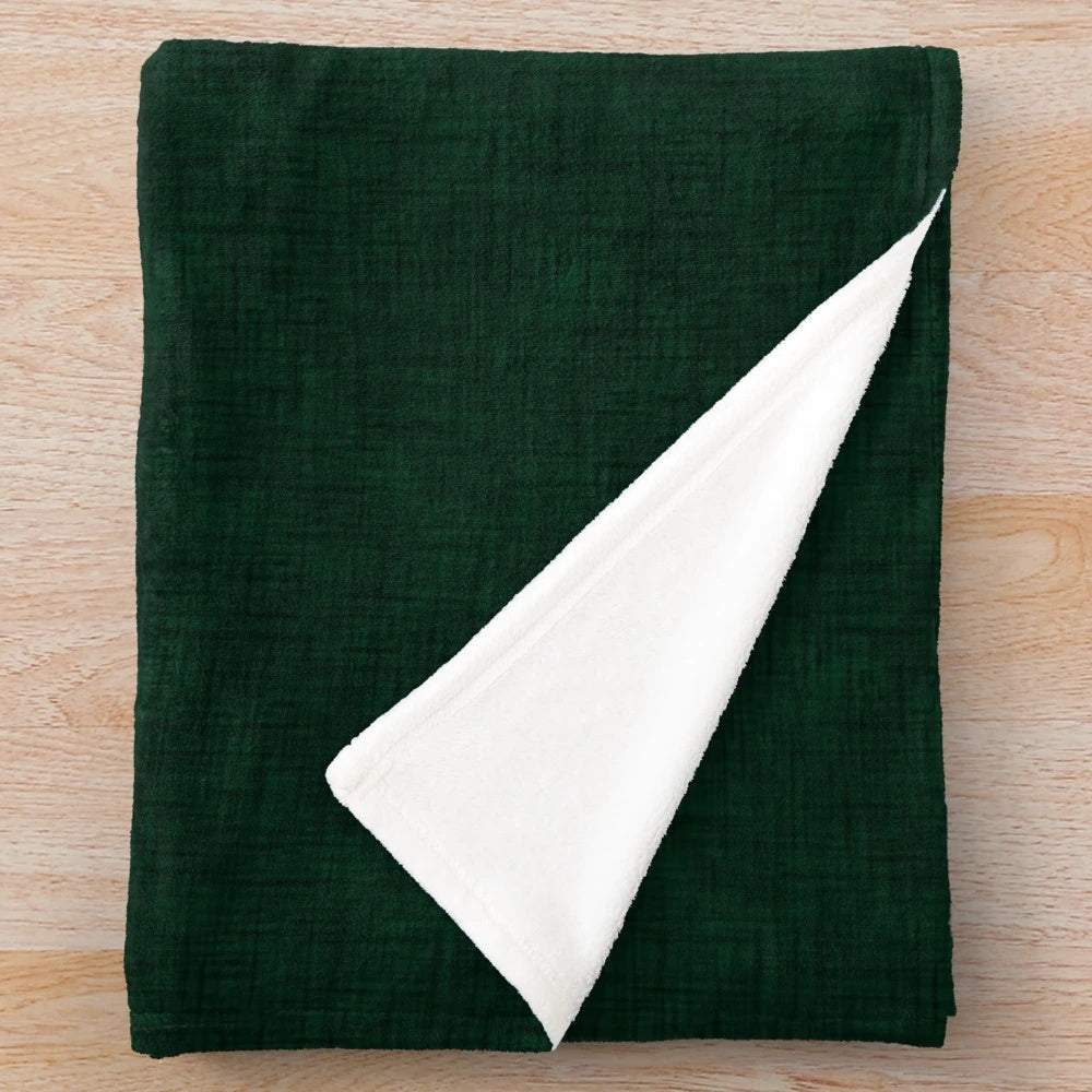 Textured dark green plush blanket for cozy home decor