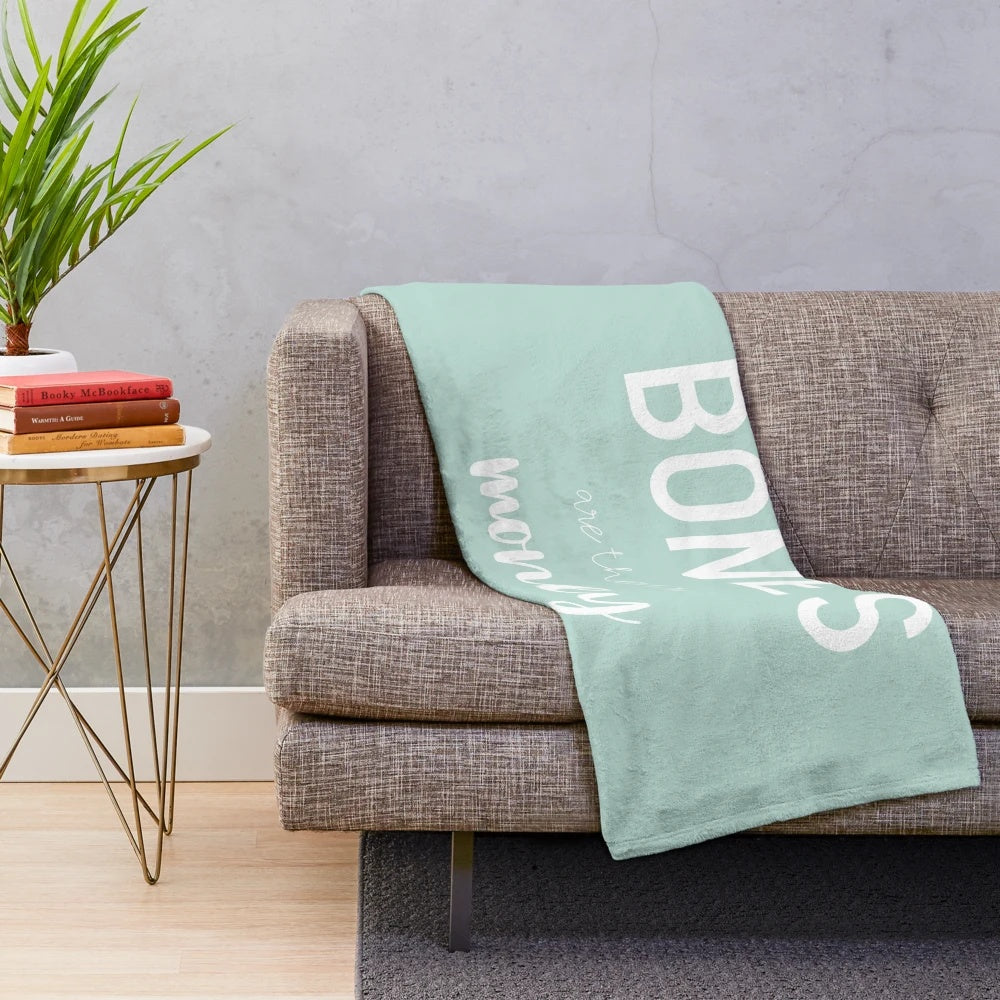 Soft and comfortable plush blanket featuring "The Bones are Their Money" design for i think you should leave and SNL fans