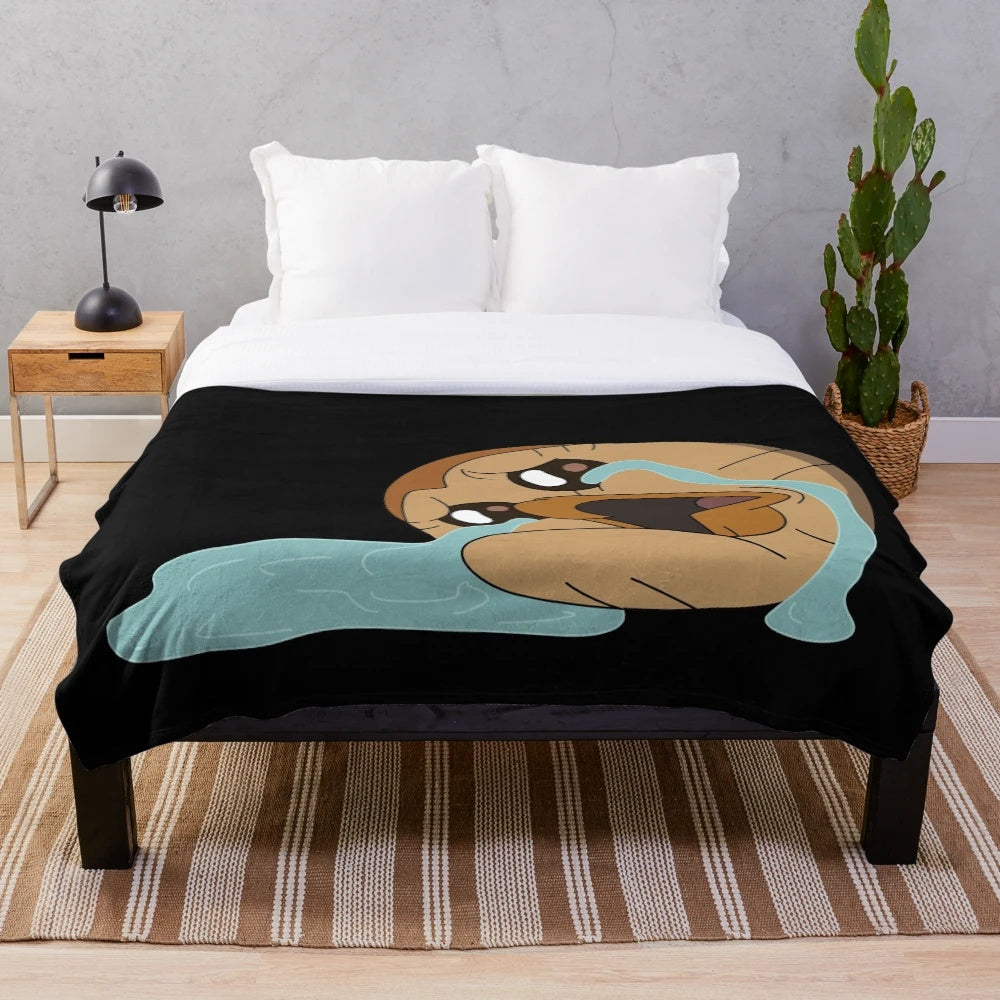 Hooty the Owl from The Owl House on a plush blanket