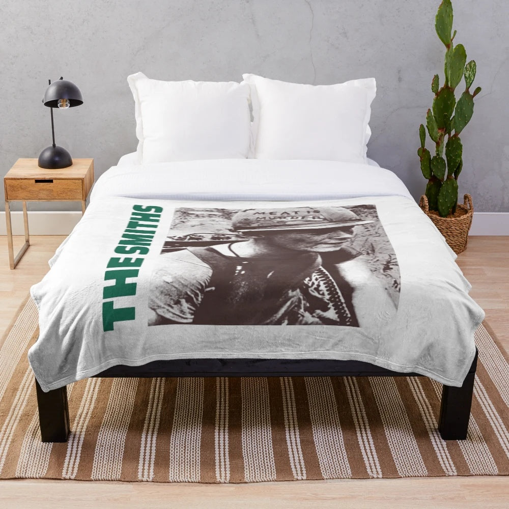 The Smiths-inspired plush blanket with vintage cinema graphics