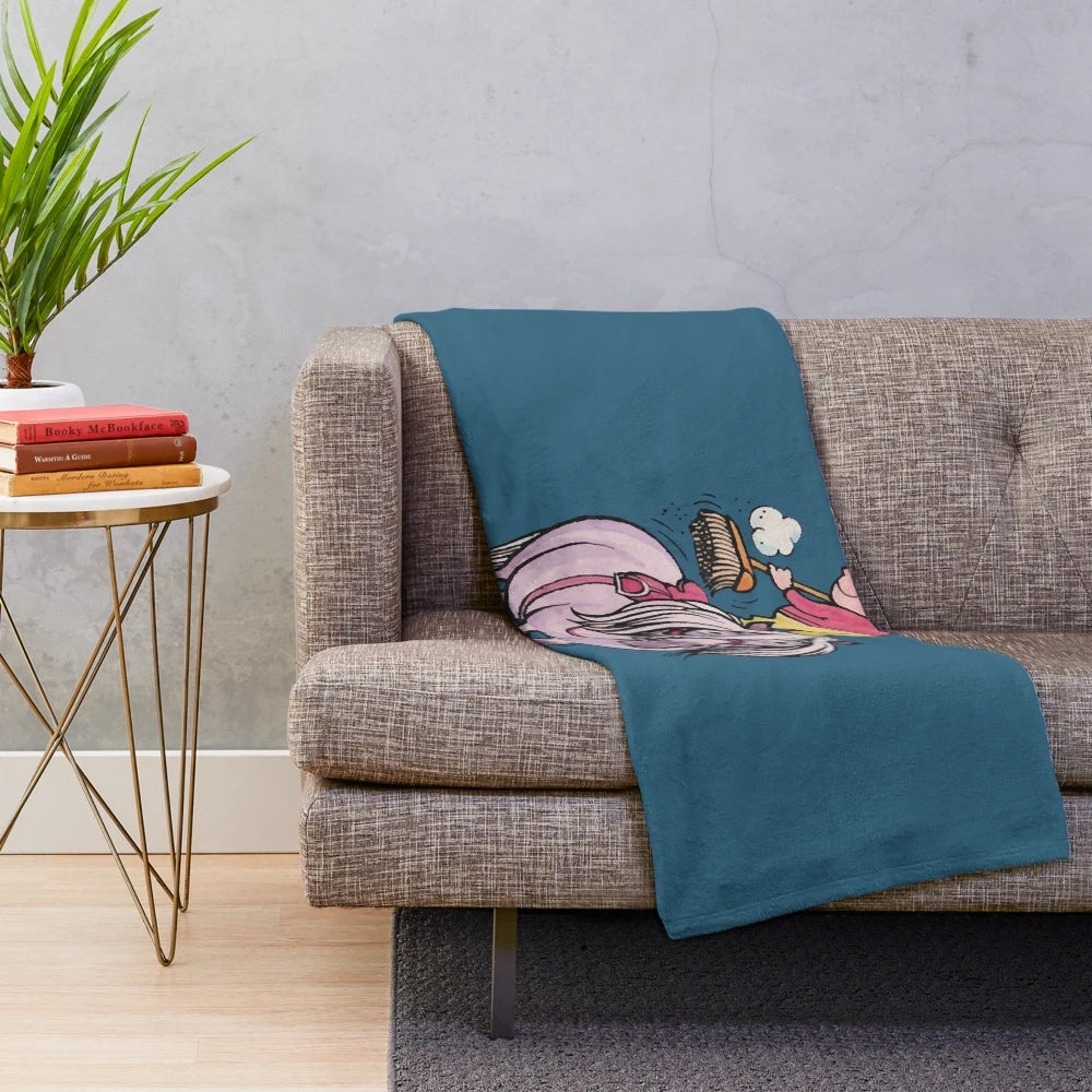 Thelwell rider plush blanket with a horse cleaning design