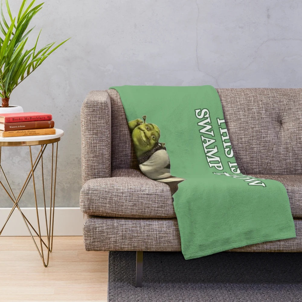 Plush blanket with a "This Is My Swamp Now" inspired design featuring a green, cartoon-like swamp scene