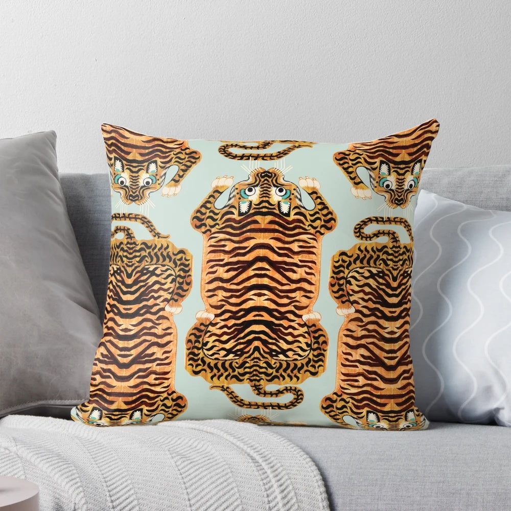 Soft, plush tiger rug pillow in sage green and gold tones, featuring a Tibetan-inspired design with realistic tiger stripes.