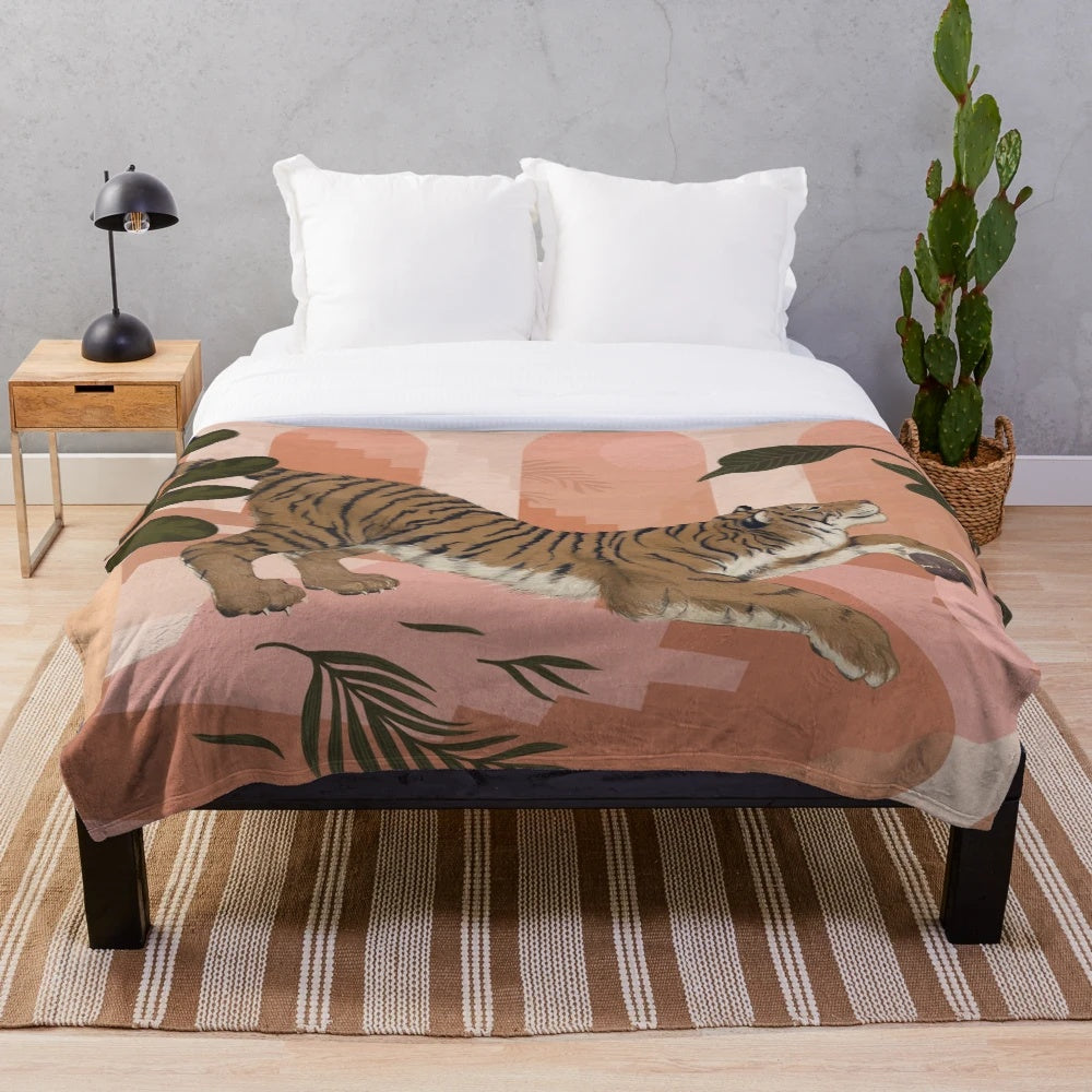 Plush tiger-inspired blanket with modern tropical foliage design