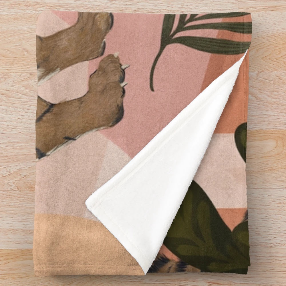 Plush tiger-inspired blanket with modern tropical foliage design