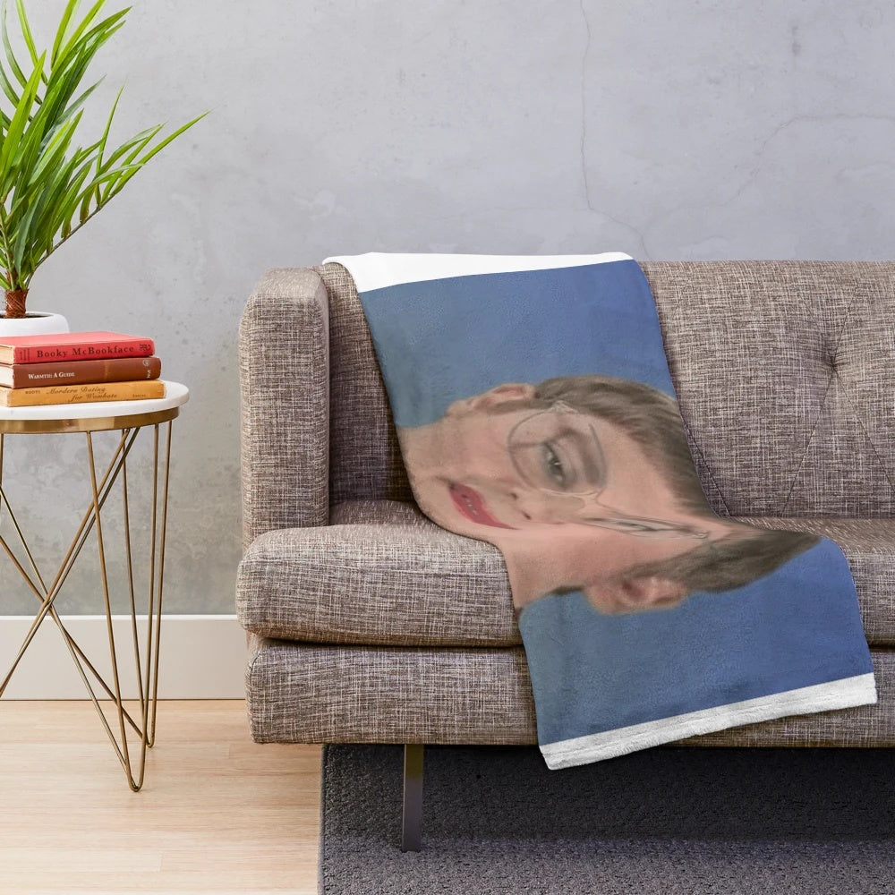 A cozy plush blanket featuring a design inspired by the popular comedy series Tim and Eric