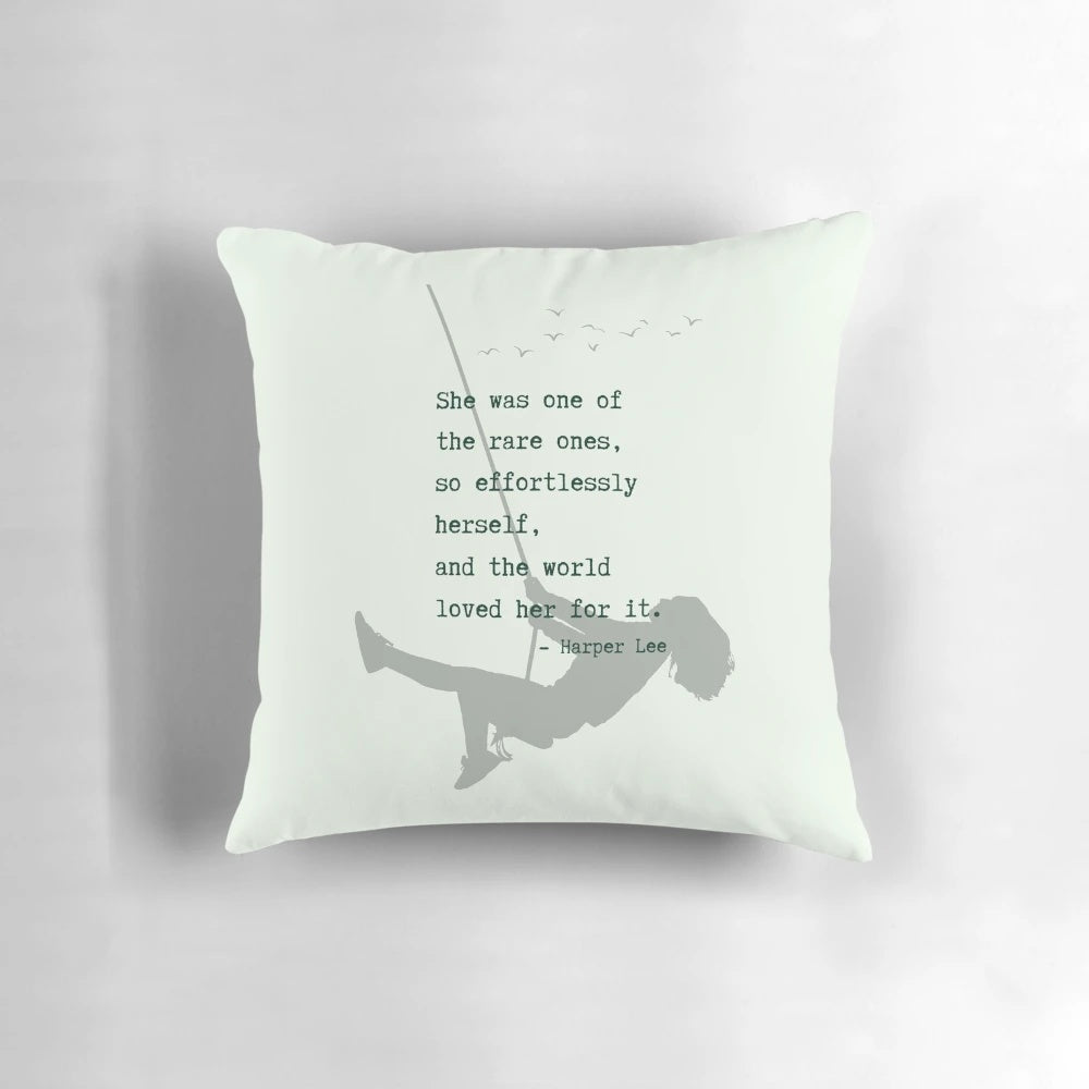 A soft, decorative pillow featuring the iconic "To Kill a Mockingbird" book cover design.