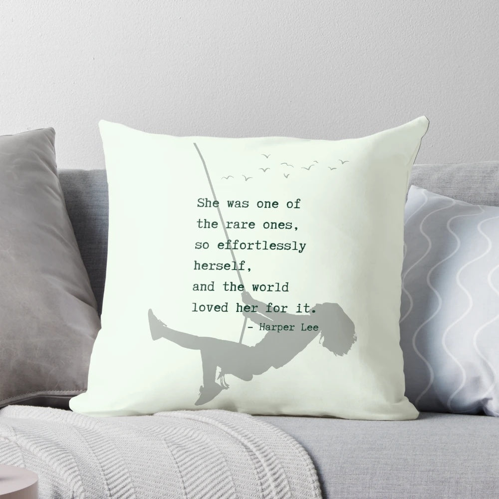 A soft, decorative pillow featuring the iconic "To Kill a Mockingbird" book cover design.