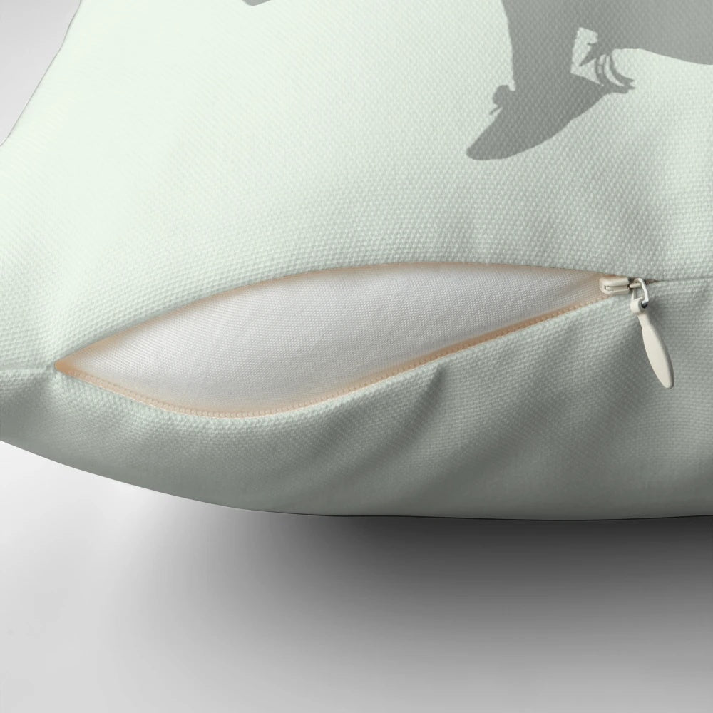 A soft, decorative pillow featuring the iconic "To Kill a Mockingbird" book cover design.