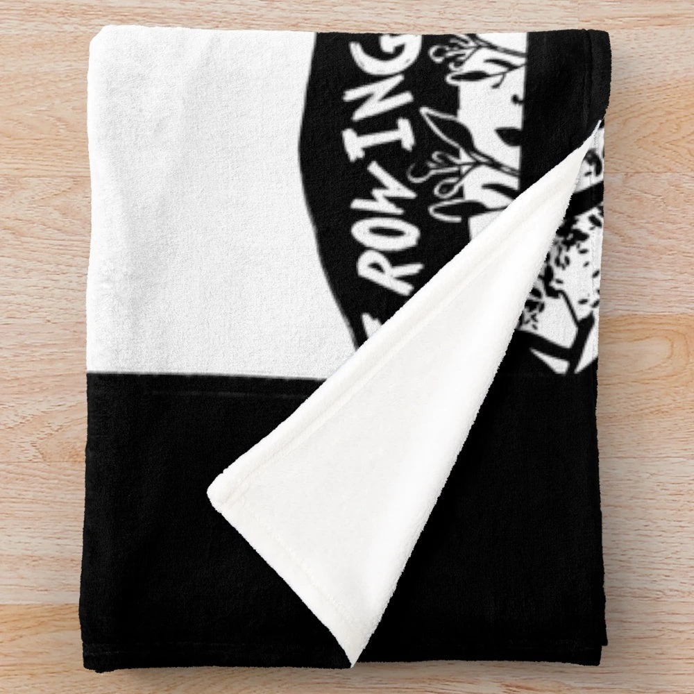 Soft, plush blanket featuring a portrait of singer-songwriter Tom Waits and the title of his album "Crooked Tree