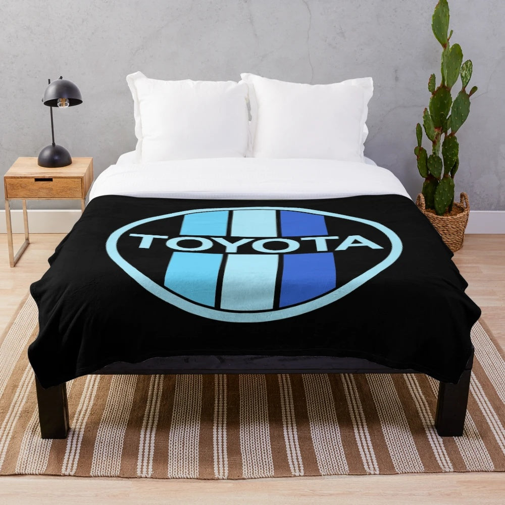 Toyota-inspired blue plush blanket with circle pattern