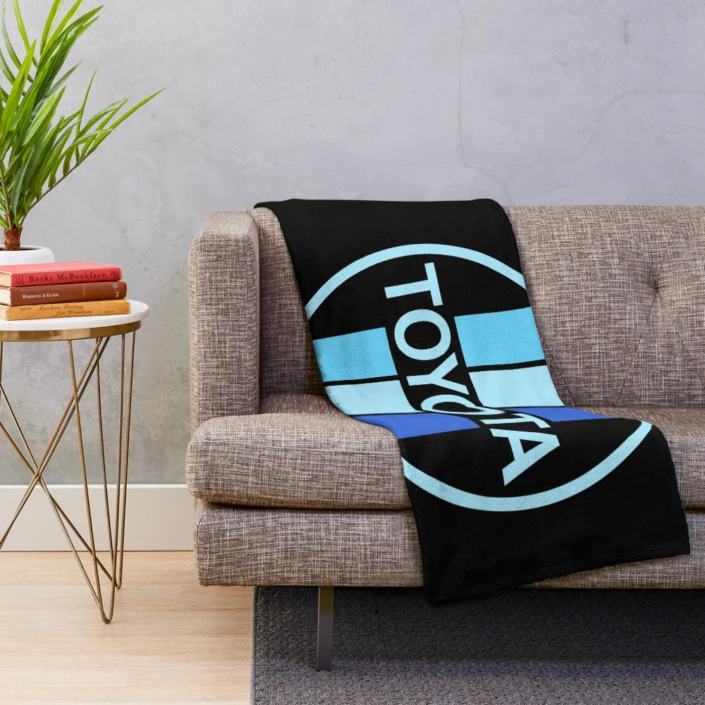 Toyota-inspired blue plush blanket with circle pattern