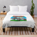 Plush blanket featuring the character of Little Grey Fergie, a popular tractor-themed cartoon