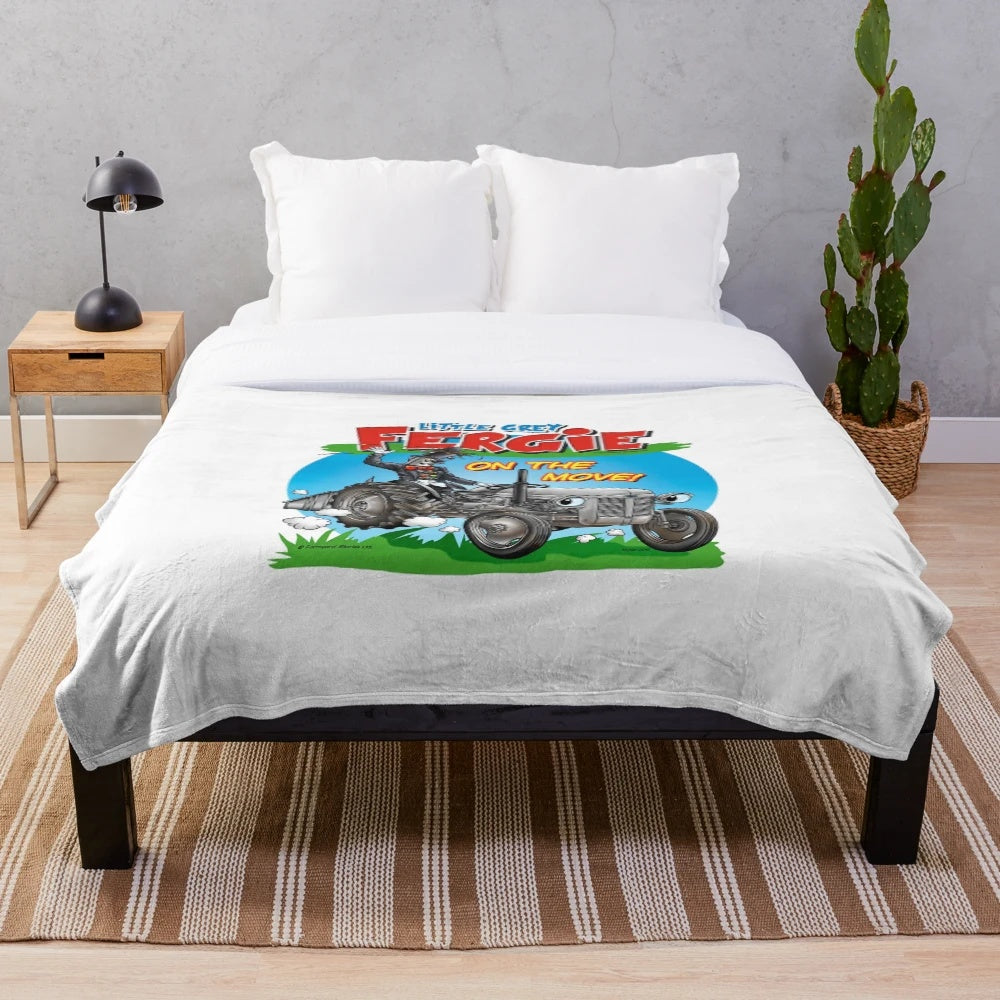 Plush blanket featuring the character of Little Grey Fergie, a popular tractor-themed cartoon