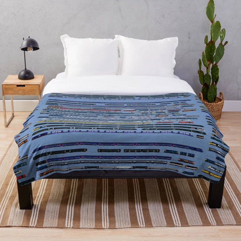 Plush blanket with train and locomotive design