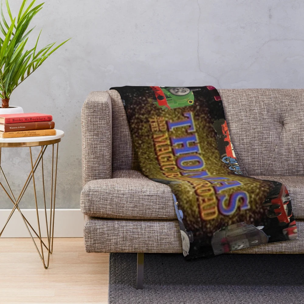 Thomas & The Magic Railroad-inspired plush blanket featuring colorful train graphics