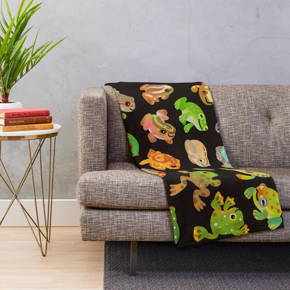 Soft and cuddly plush blanket featuring a detailed tree frog design