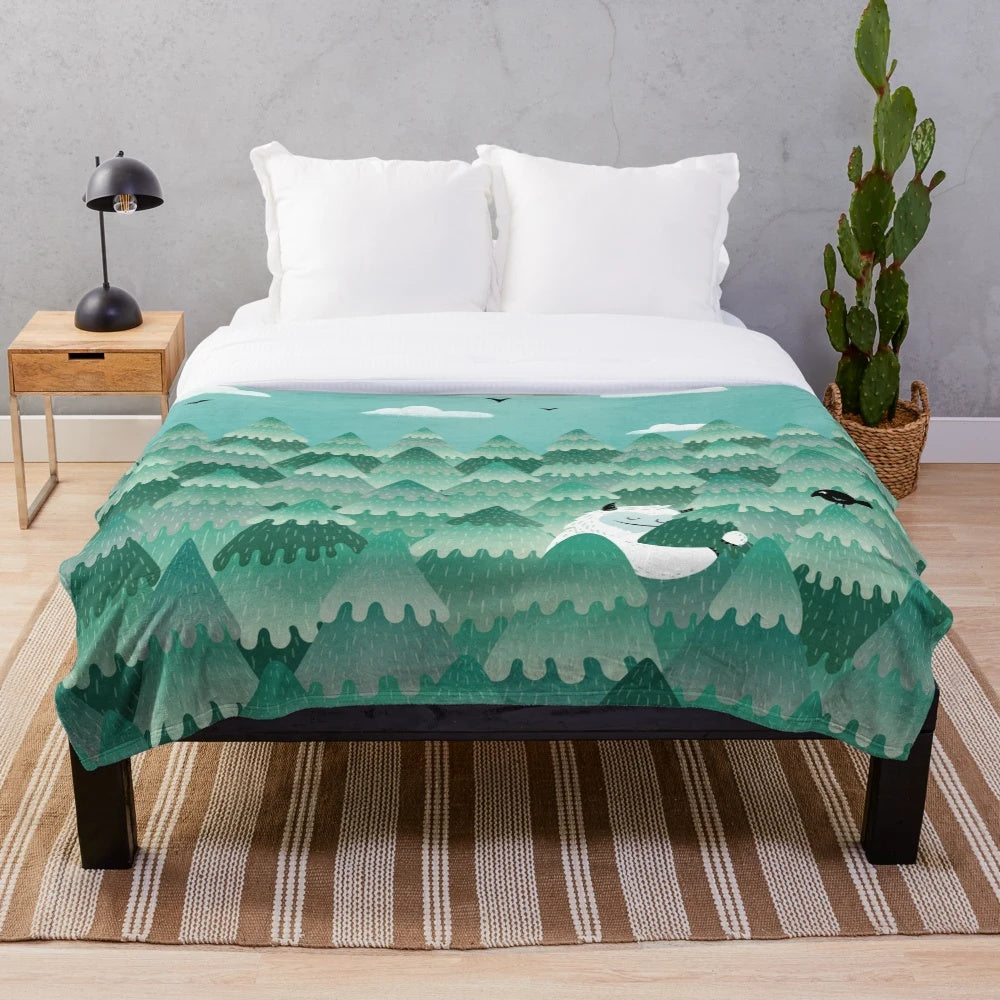 Soft and cuddly plush blanket featuring a cute forest creature design